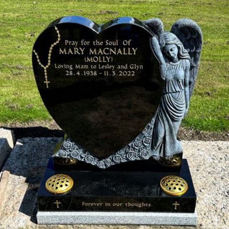 Black heart memorial with standing carved angel design. Gold etched rosary beads with gilded letters