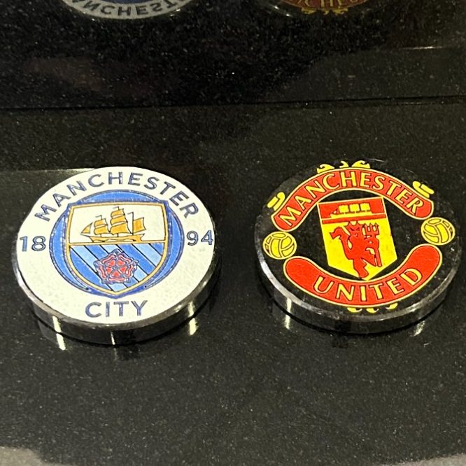 Painted football club badges