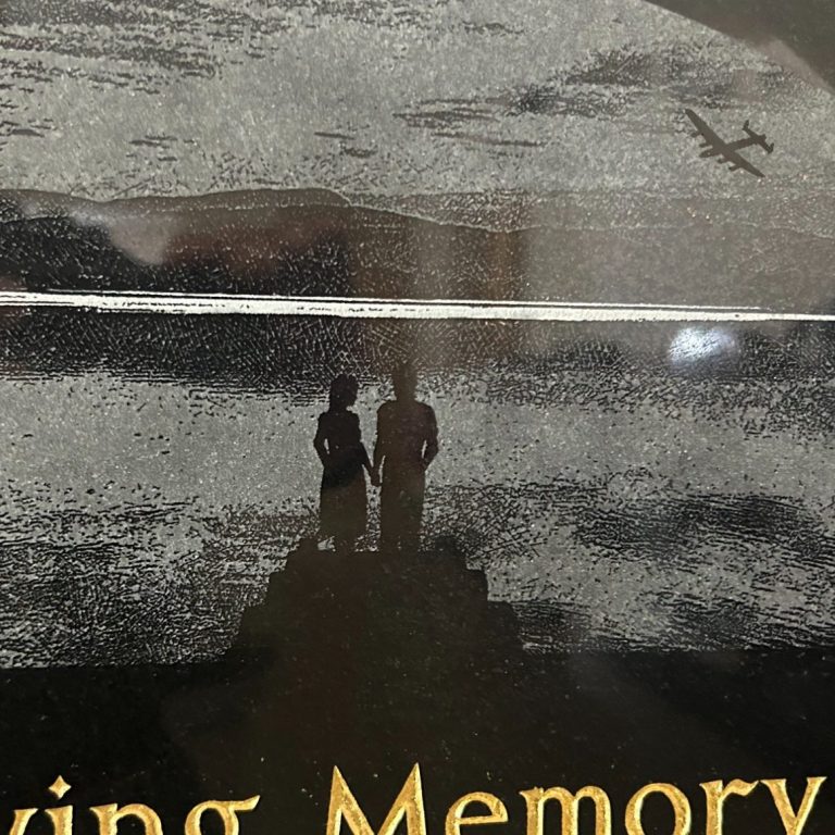 Memorial with Etched Scene and Lancaster Bomber to reflect deceaseds time in the war