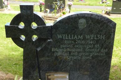 Traditional lawn memorial with Celtic cross and etching