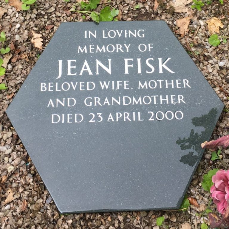 Black honed granite cremation memorial with silver lettering